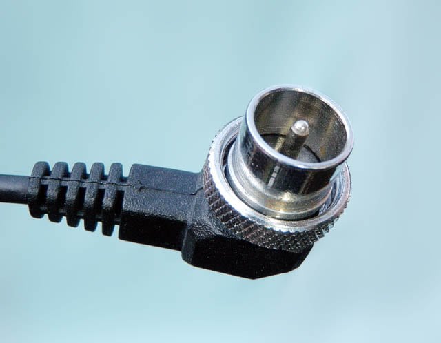 An Amphenol cable connector used on Elinchrom equipment; identify the exact family before mating.