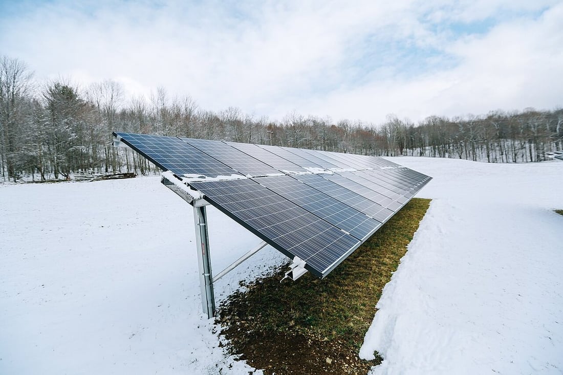 Snow-covered surroundings illustrate outdoor cold-weather installation conditions.
