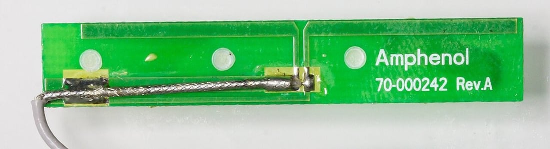 An Amphenol RF antenna assembly; communication links differ from ordinary continuity circuits.