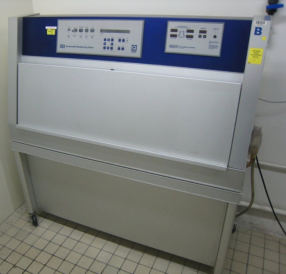 An accelerated UV-weathering chamber used to evaluate sunlight and moisture exposure.