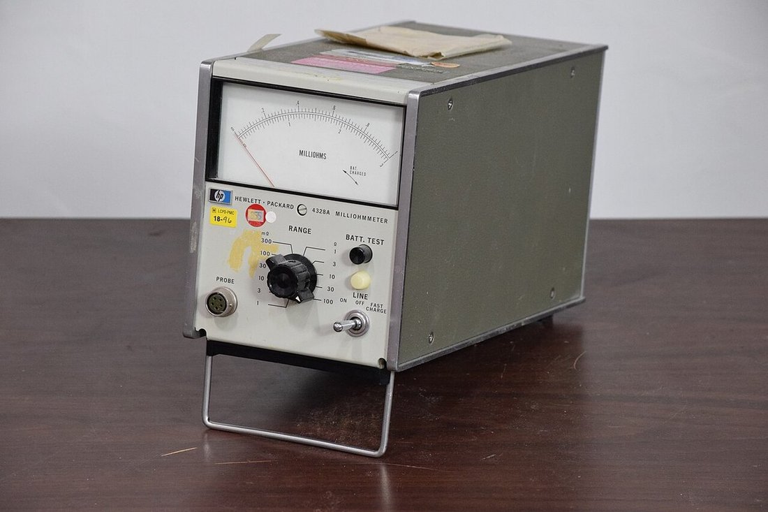 A milliohmmeter illustrates a specific measurement, not a complete qualification record.