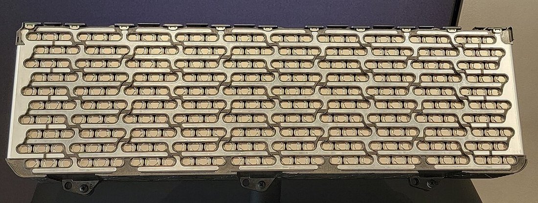 A traction-battery pack illustrates the scale of the high-voltage system review.