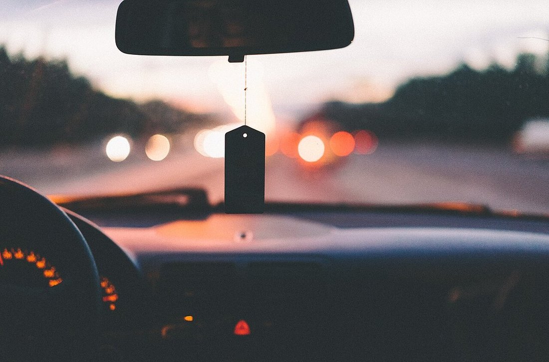 Passenger-cabin controls and displays form one installation zone, not the whole vehicle environment.