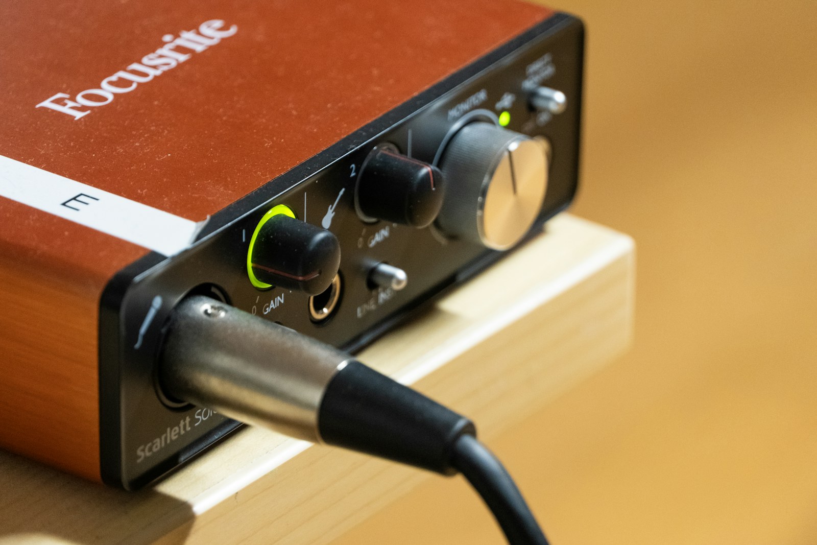 Desktop audio interface with connected cables