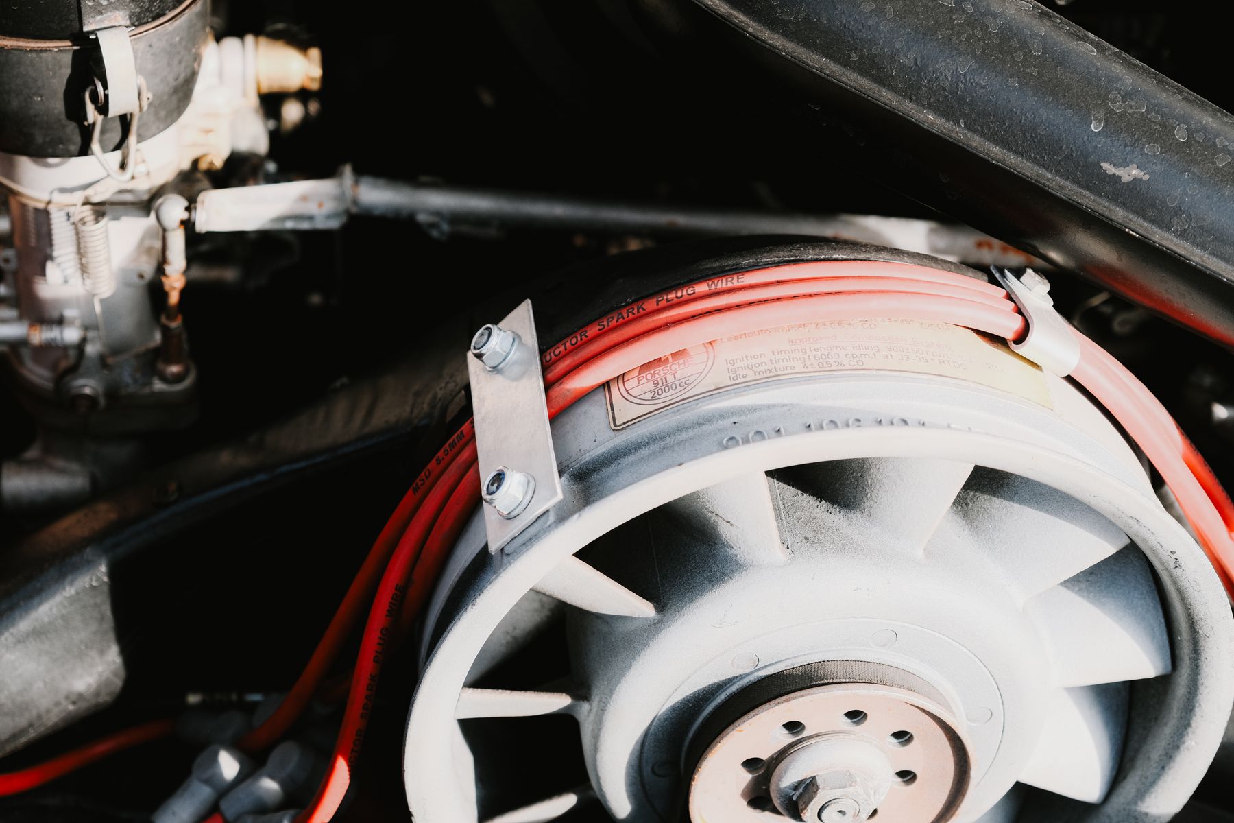 Automotive wiring routed through an engine compartment