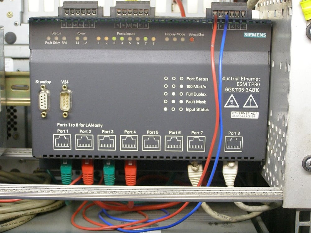 Industrial Ethernet switch and installed network cabling.