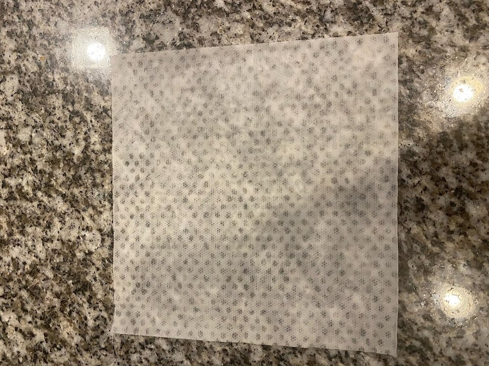 Cleaning-wipe context; chemical compatibility must be confirmed for the actual assembly.
