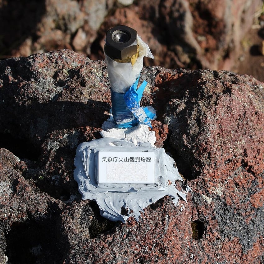 Outdoor monitoring sensor exposed to a real field environment.