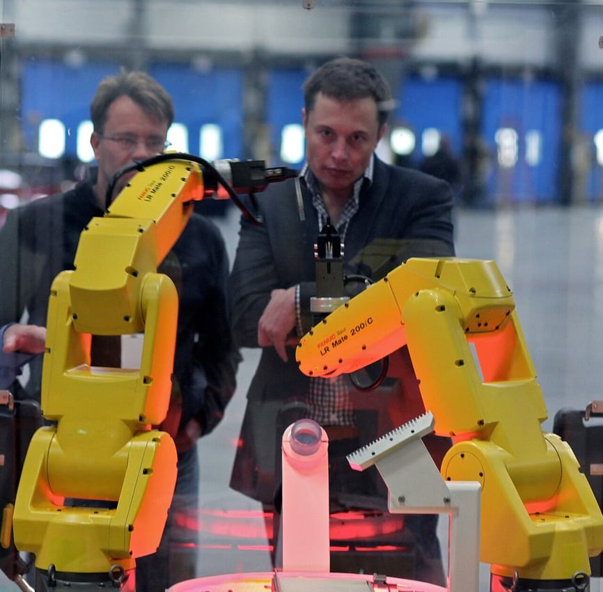 Industrial robot demonstration illustrates moving equipment and routing constraints.