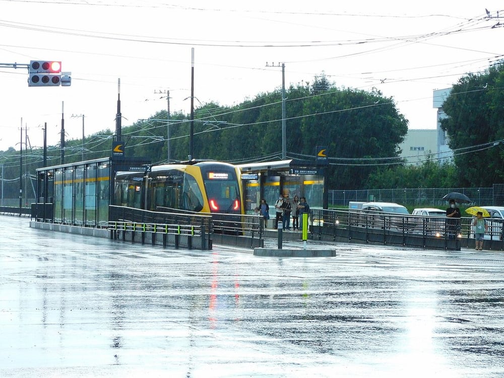 Rail transport in heavy rain illustrates the actual exposure environment.