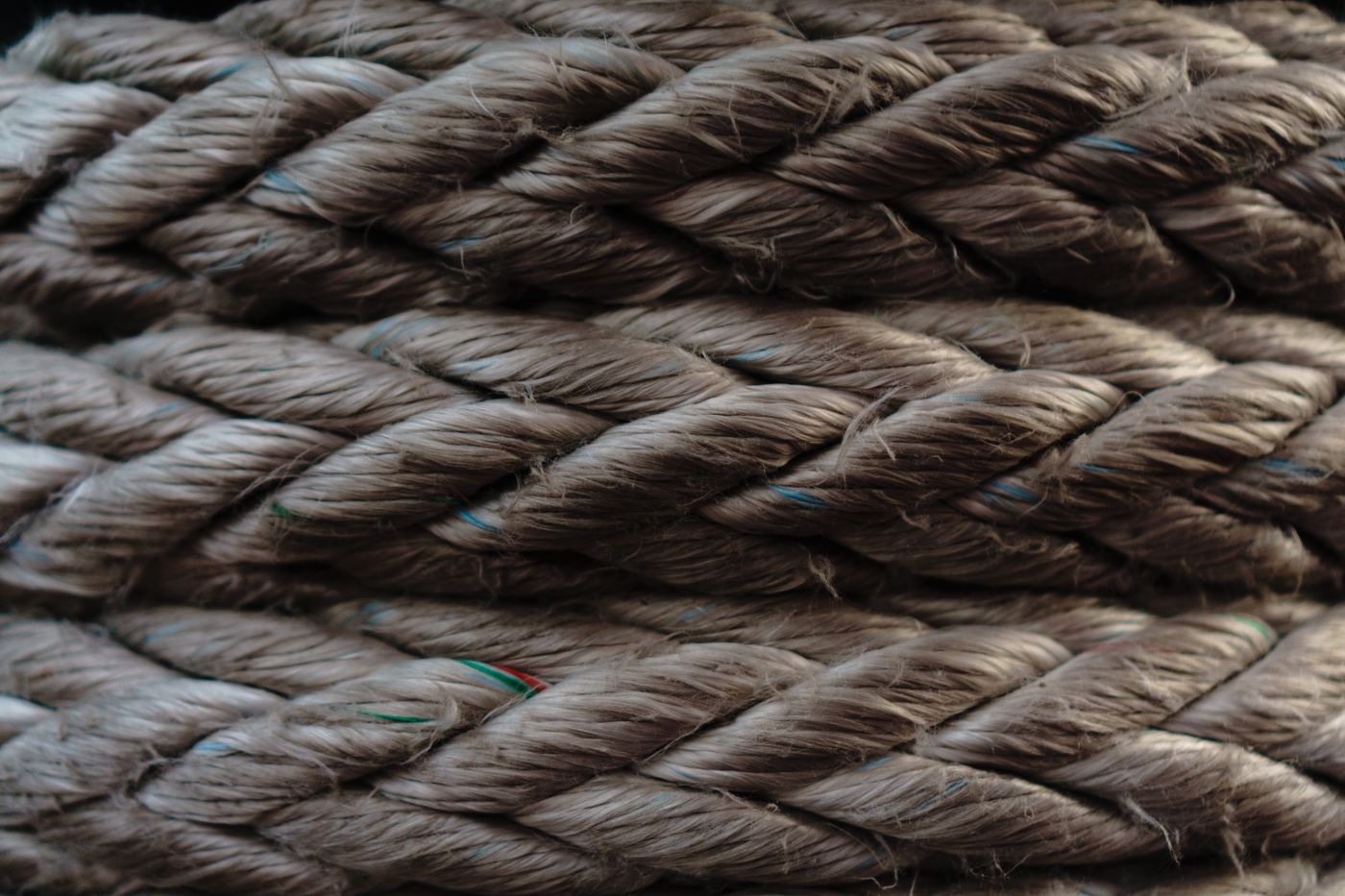 Expandable PET abrasion braid