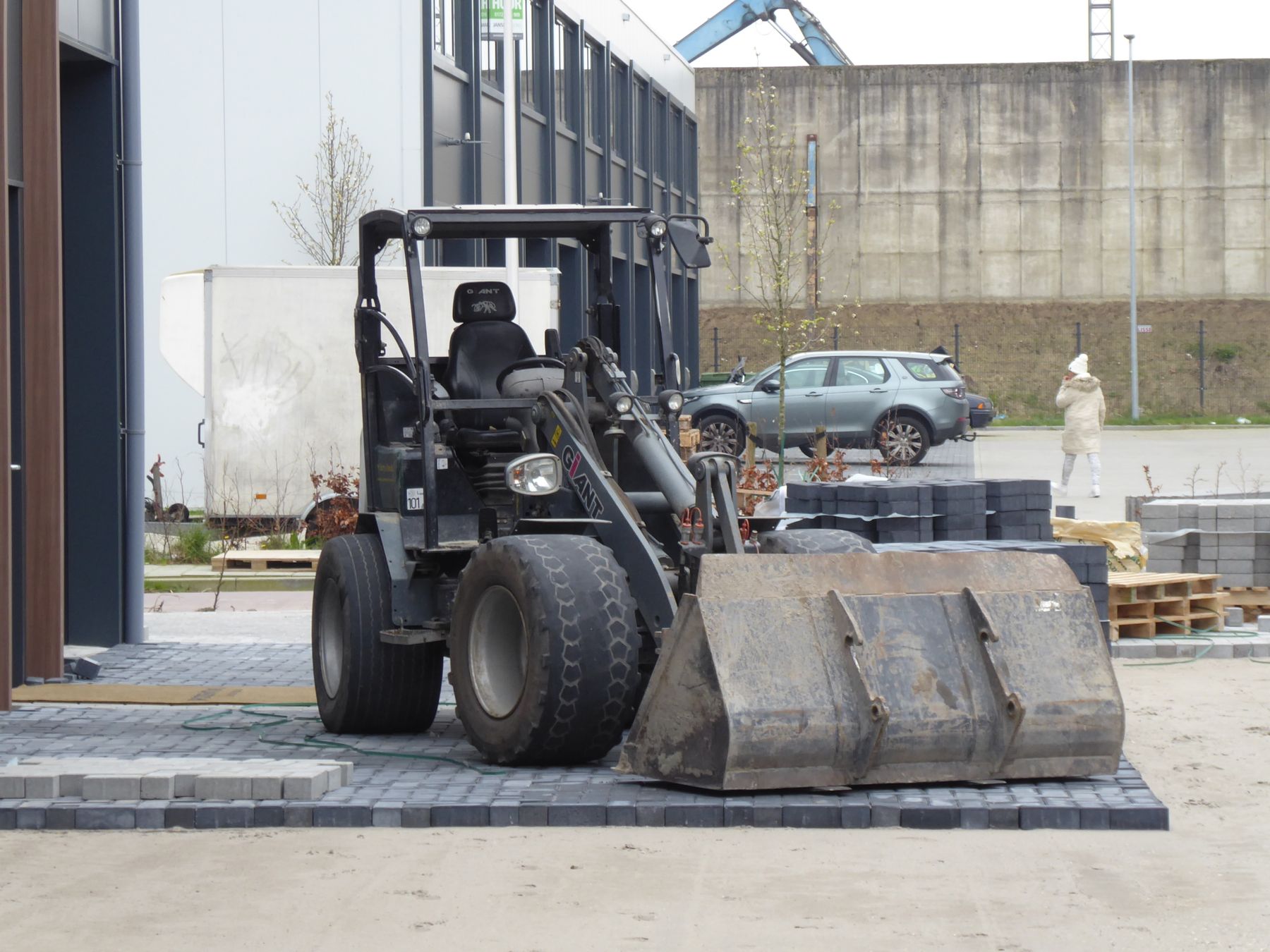 Wheel loader parked in an industrial yard