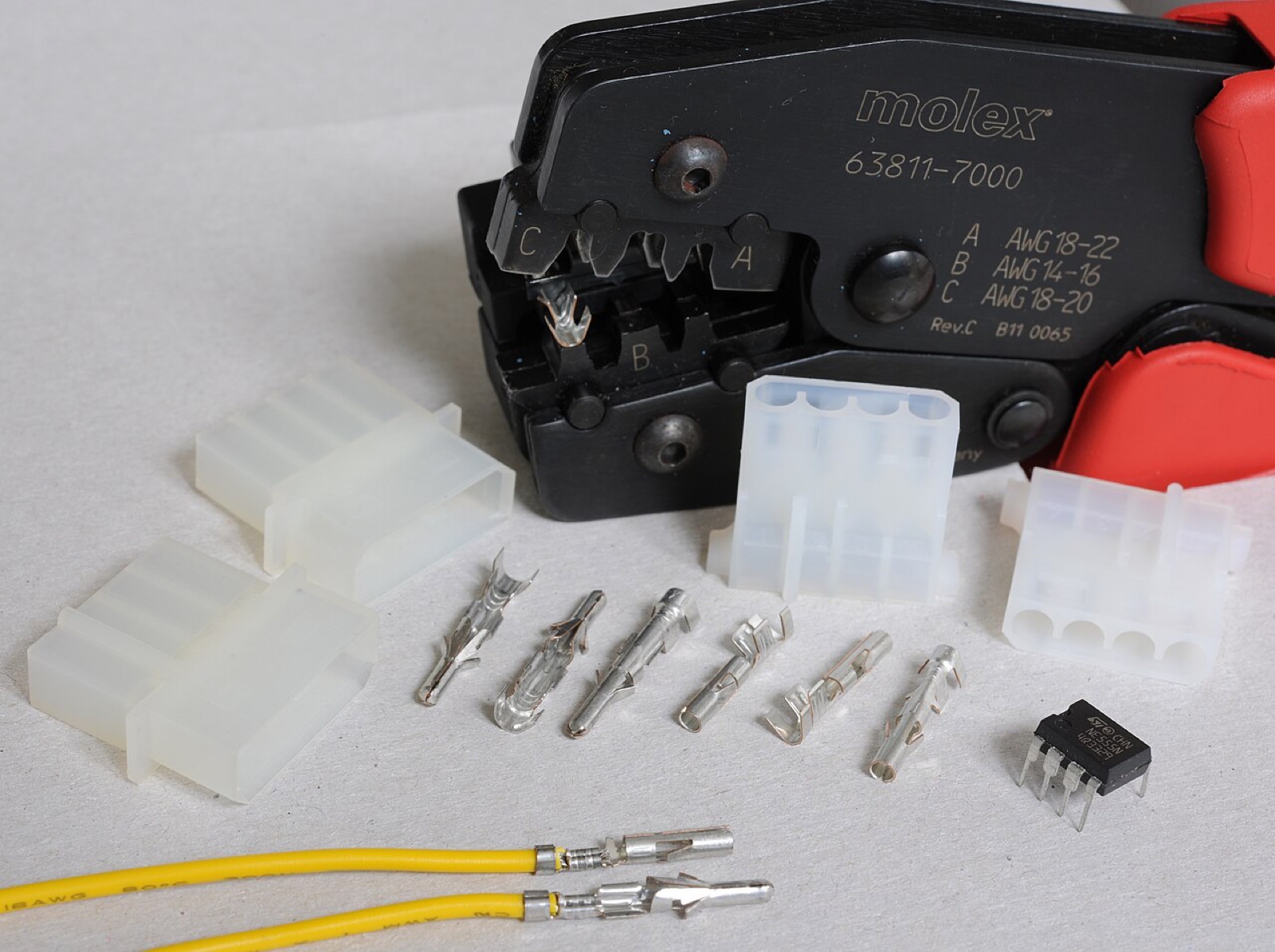 Molex-branded crimp tool with connector housings and loose metal terminals