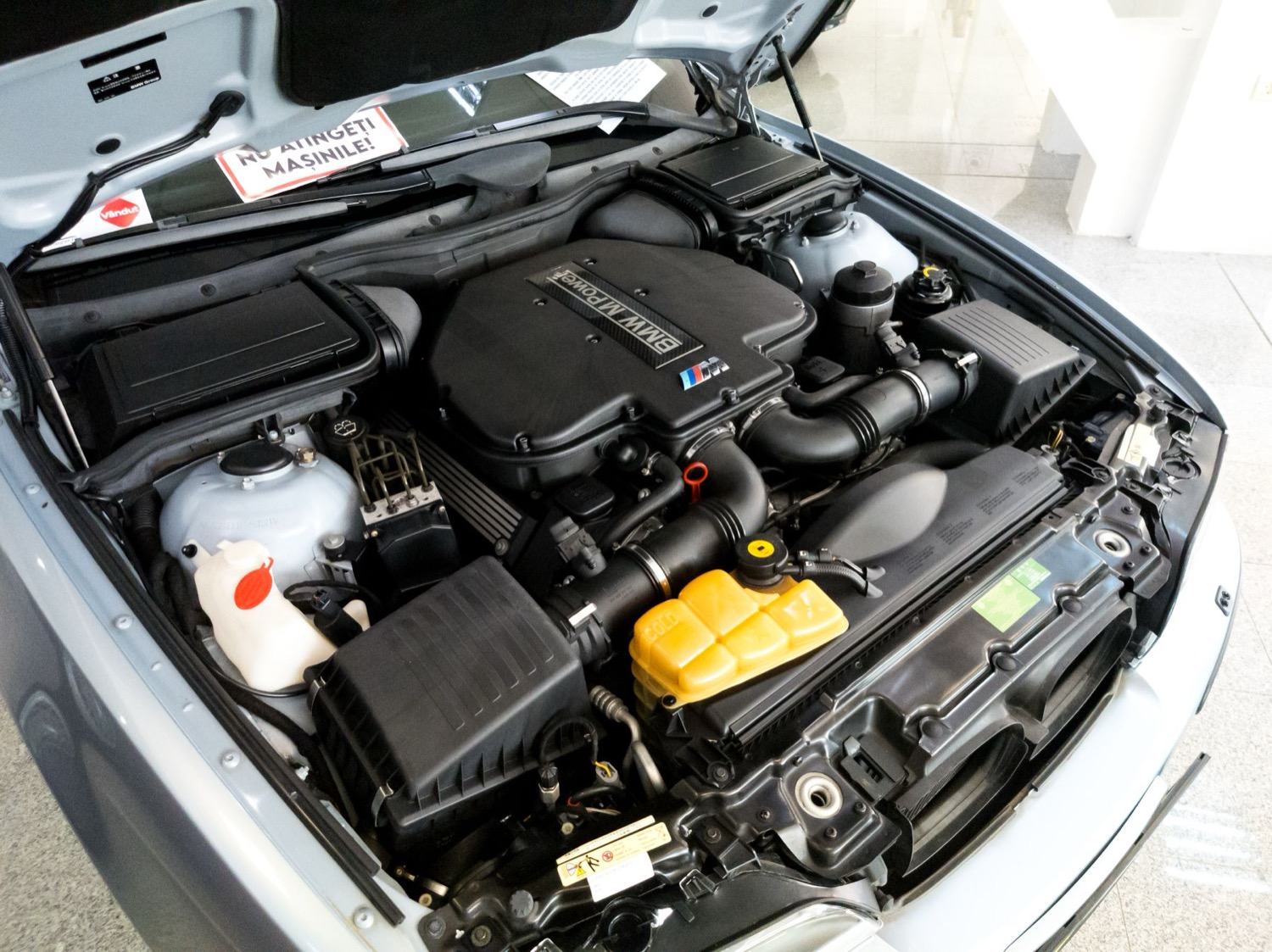 Engine bay with installed wiring and electrical components