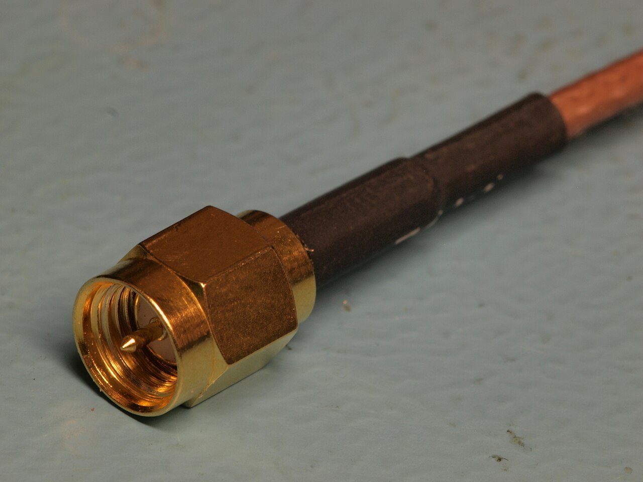 An SMA cable termination: verify the center contact as well as the outer coupling.