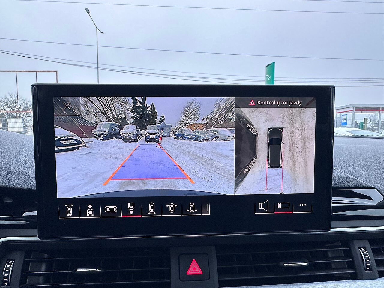 Rear-view display application; camera electronics determine the required channel.