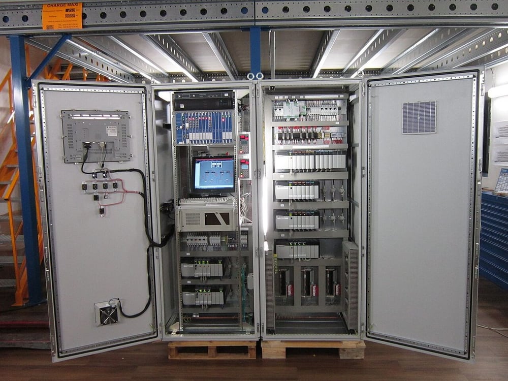 A compressor PLC cabinet illustrates industrial control wiring and maintenance access.