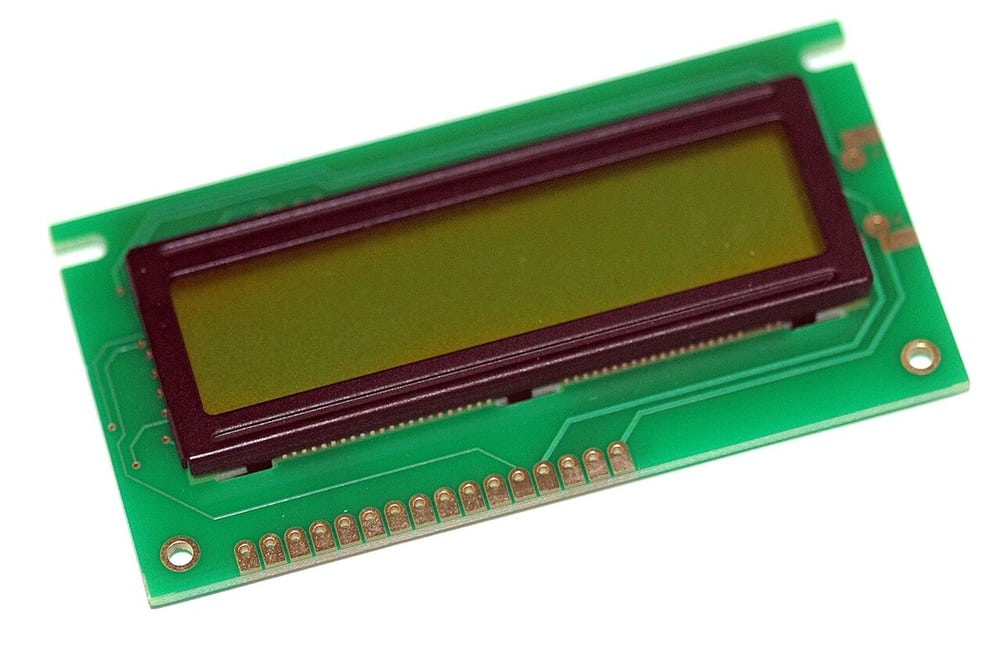 A compact LCD module illustrates space-constrained embedded electronics.