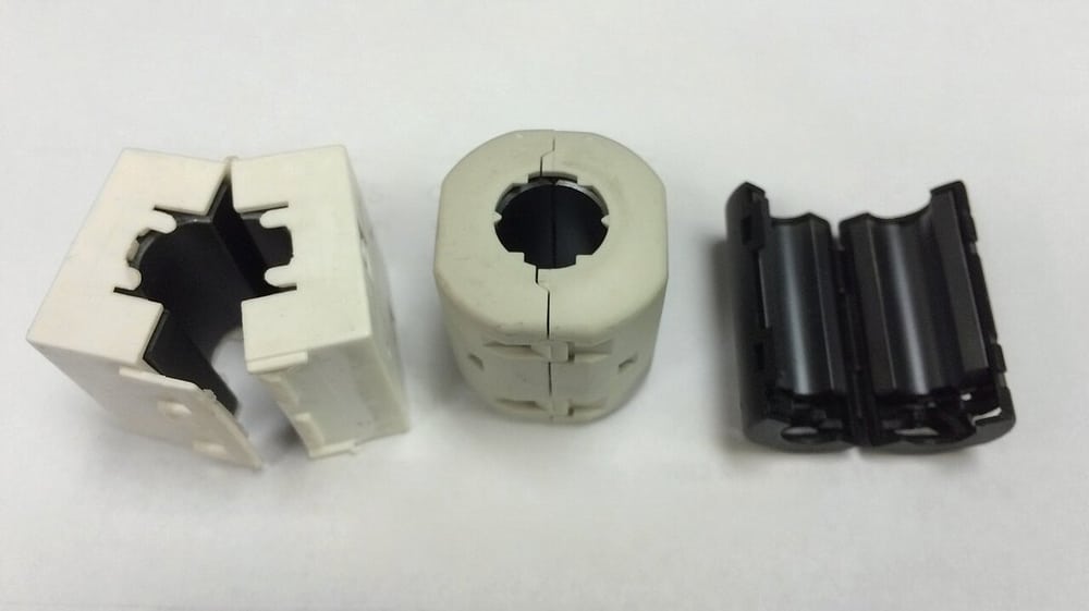 Split ferrite cores illustrate selectable suppression components.