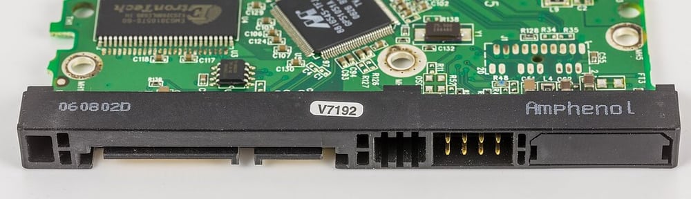An Amphenol-marked board connector illustrates the need for an exact interface reference.