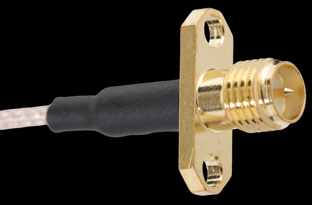 An RP-SMA coax termination illustrates cable-to-contact construction; RP-SMA and SMA mating polarity must be distinguished.