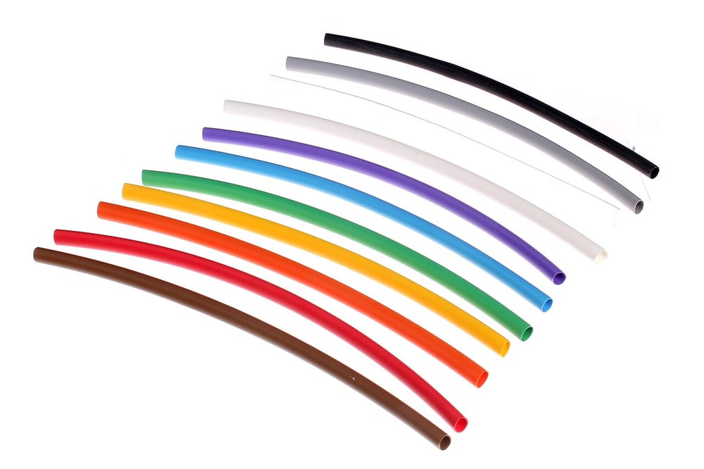 Heat-shrink tubing illustrates local sleeving; material and adhesive selection remain project-specific.