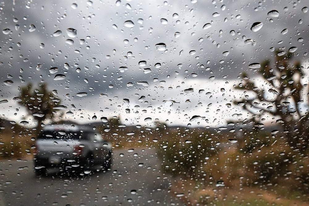 Rain on a vehicle windshield represents external exposure, not an assembly waterproof test.
