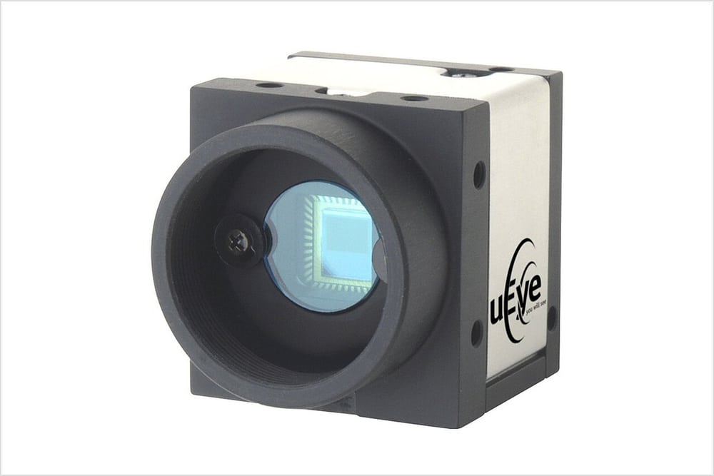 An industrial camera illustrates the space available for external equipment connections.