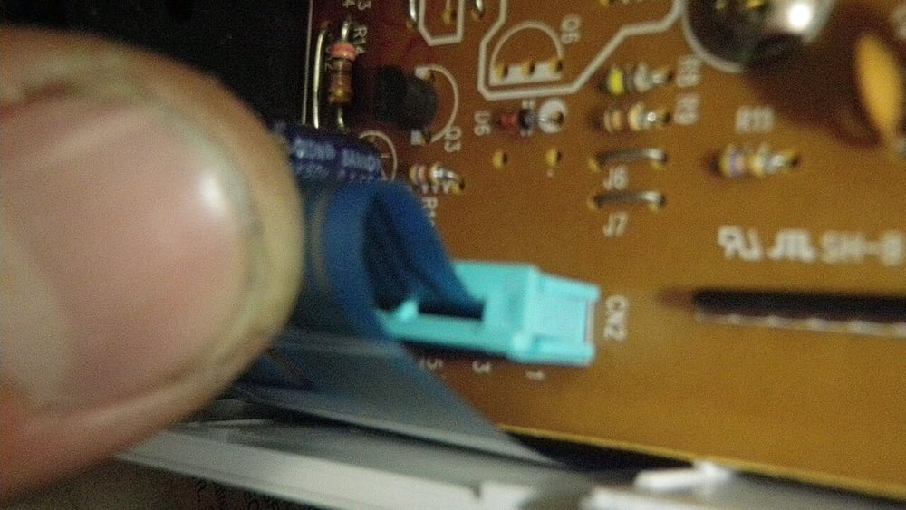 Board-mounted ribbon connection: housing access and cable exit are part of the layout review.