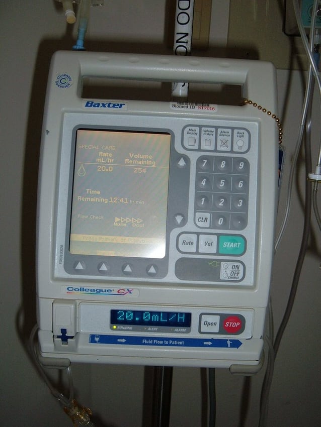 An infusion pump illustrates equipment context; no patient-contact or device approval is implied.