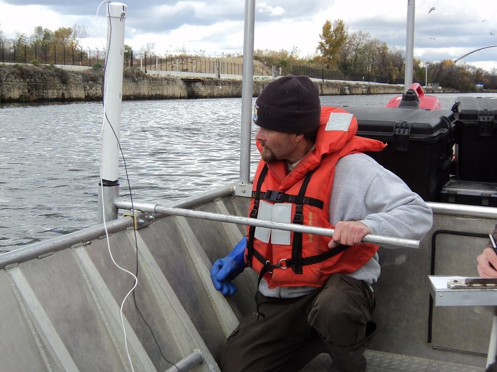 Field electrical measurements near water illustrate exposure requirements.