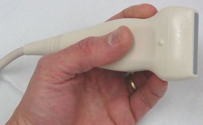 Handheld ultrasound probe and cable; medical-use context only.