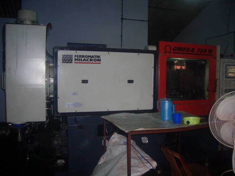 Injection-molding equipment illustrates tooling and process context.