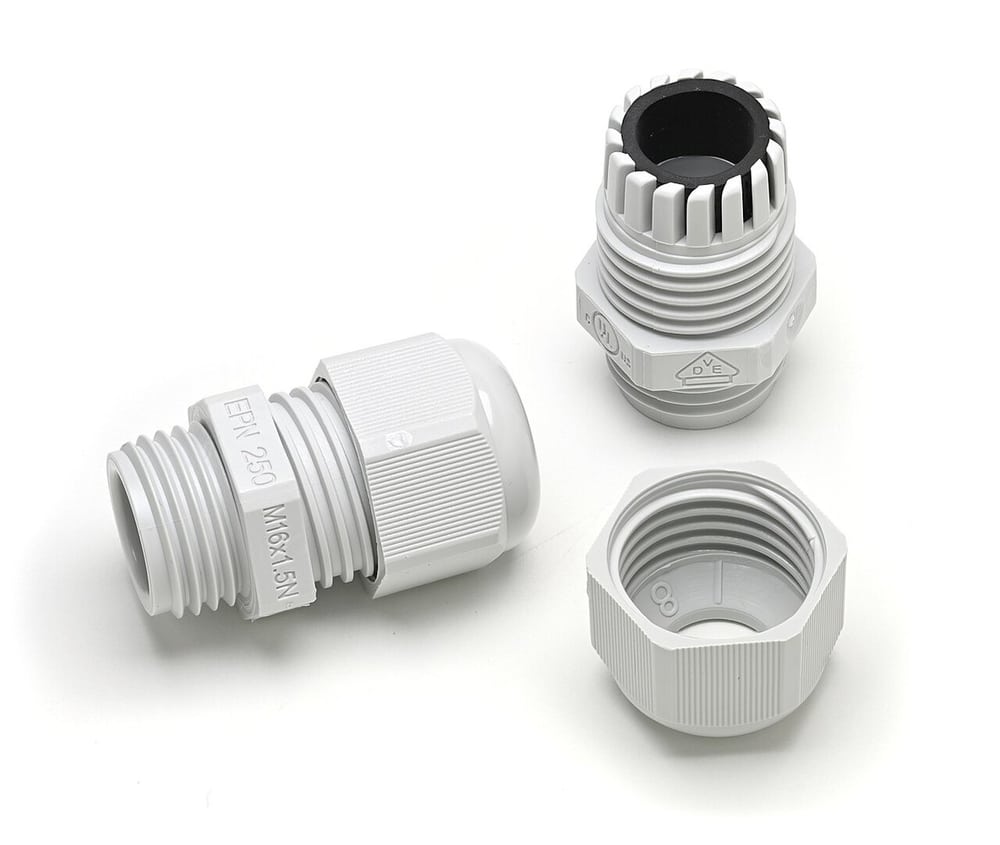 Disassembled cable gland shows jacket clamping components; it is not a LEMO collet.