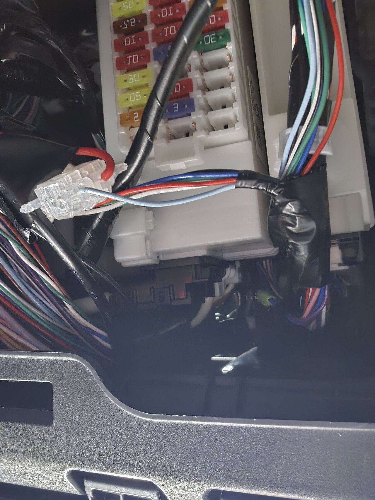 An installed fuse panel shows why access and identification belong in the layout.