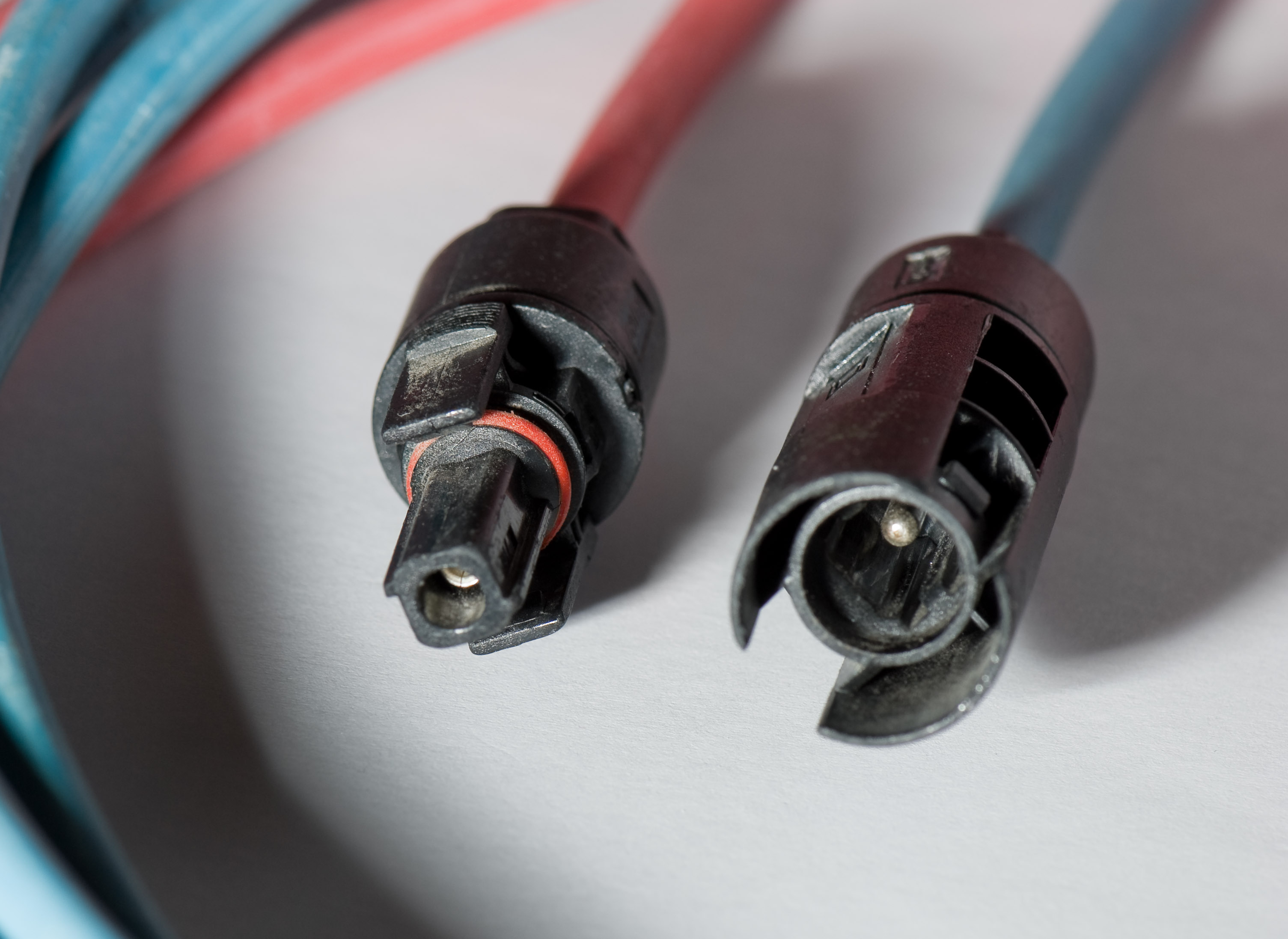 Mating ends of a pair of photovoltaic cable connectors