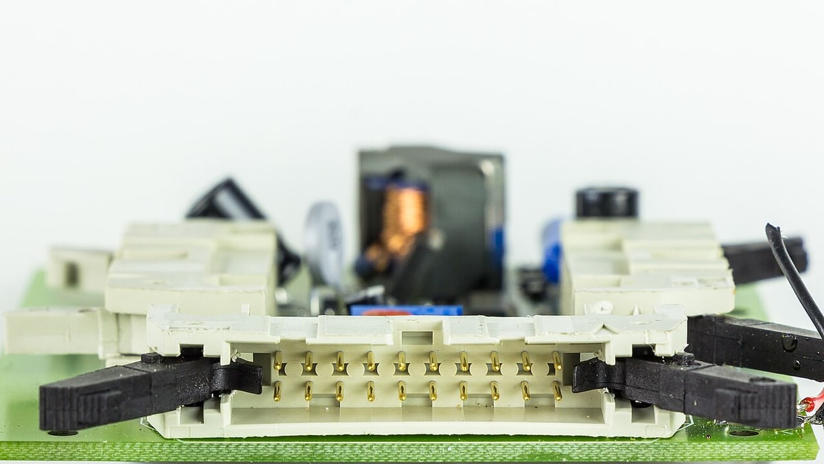 AMP-marked connector detail: markings and mechanical features help identify an interface, but do not establish interchangeability.