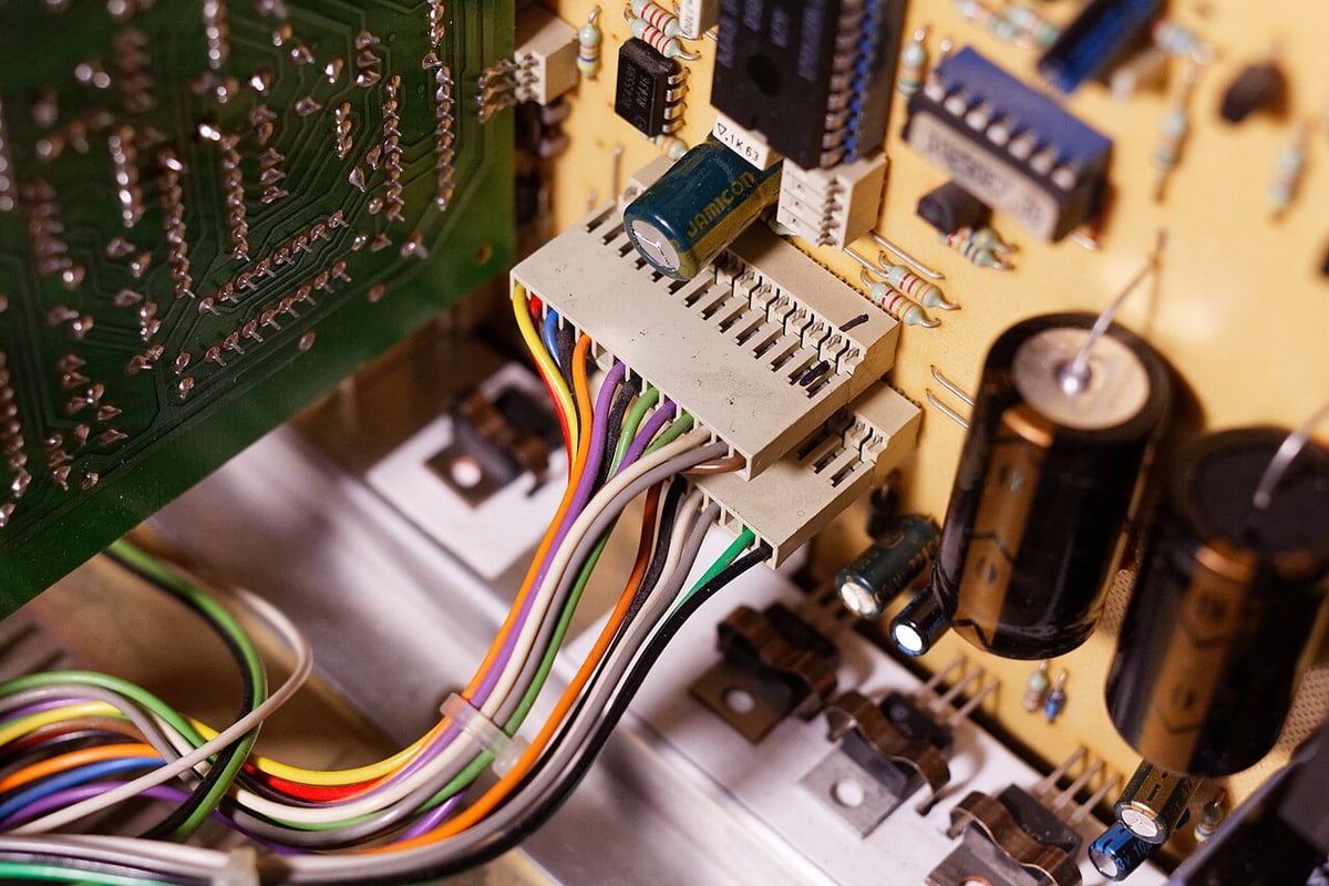 An equipment wiring loom illustrates the assembly scope; the approved BOM defines the connector brand and series.
