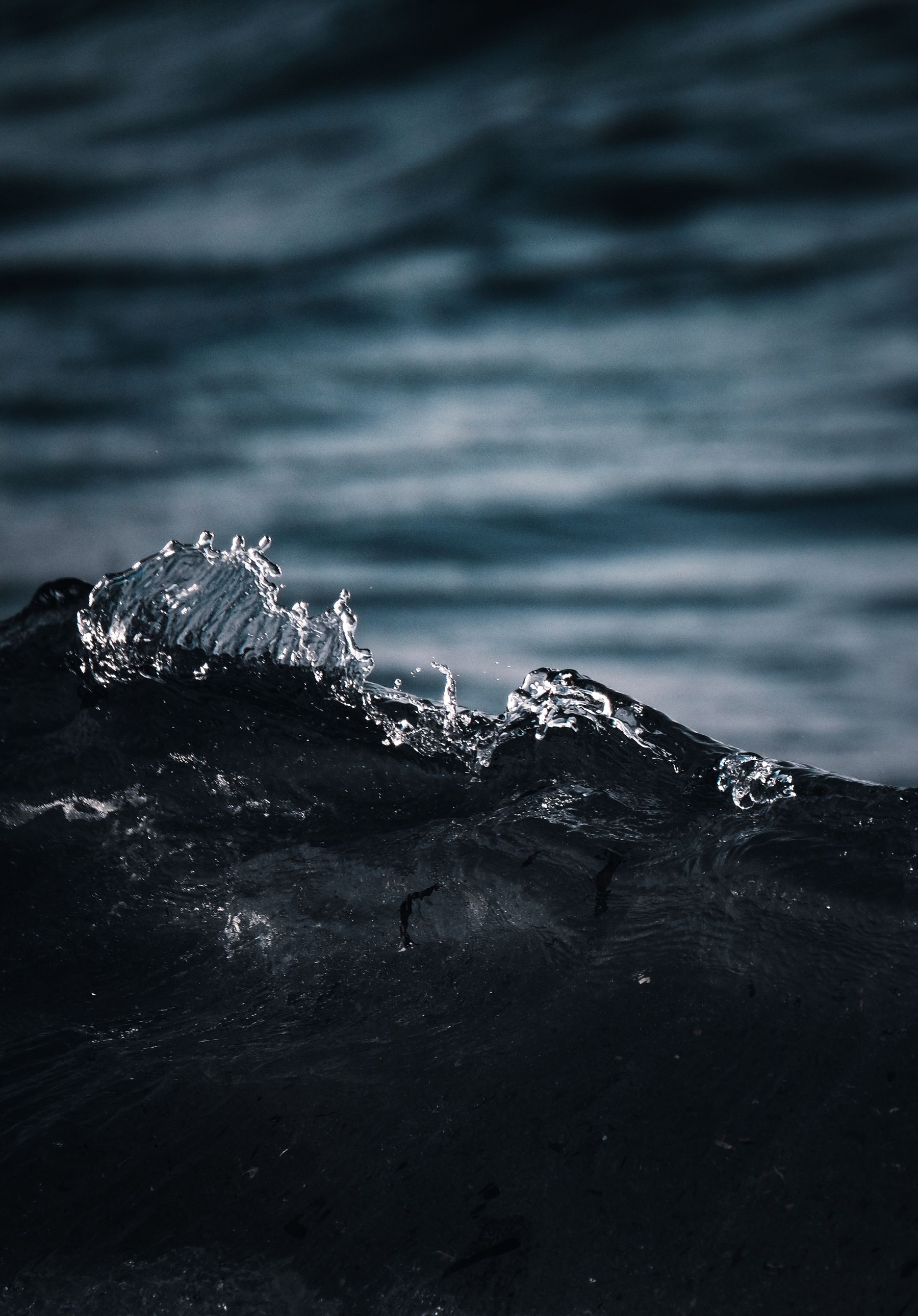 Dark water splash representing ingress exposure