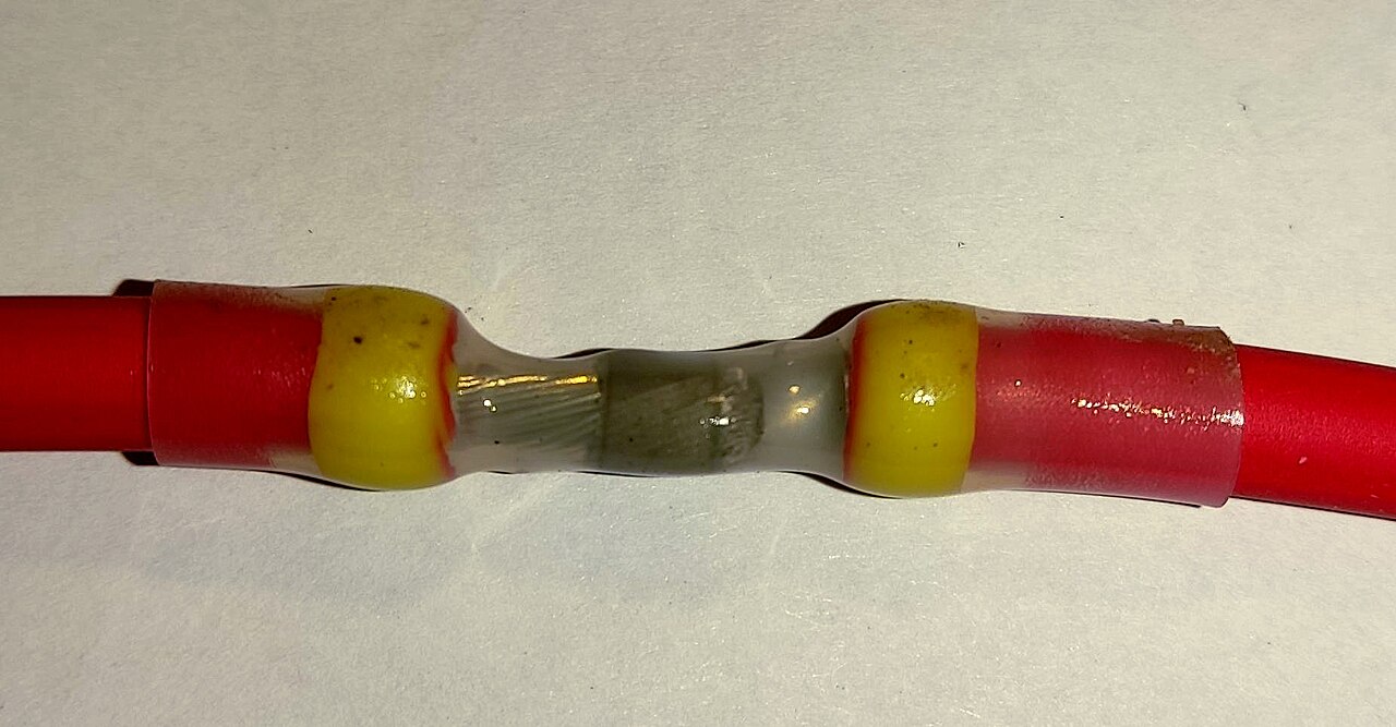 Sealed branch and splice harness